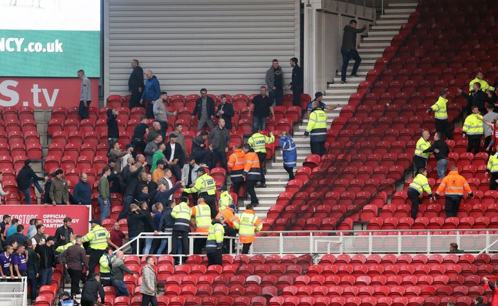 Fans clash in the stands during the Sky Bet Championship match at the Riverside Stadium, Middlesbrough