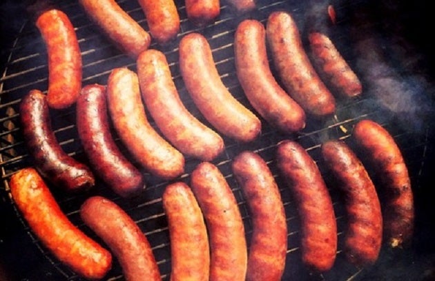 <p>Brats on the grill.</p>