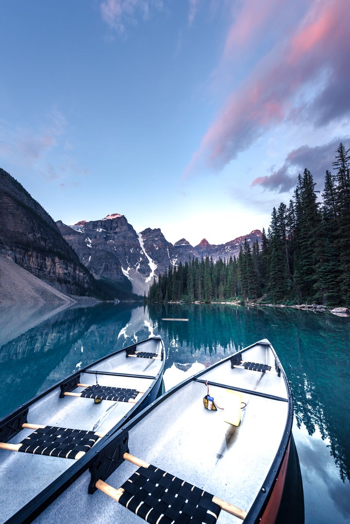 <p>Sunrise at Moraine Lake. Yes, I know the canoes are backwards but I still like it :) </p>