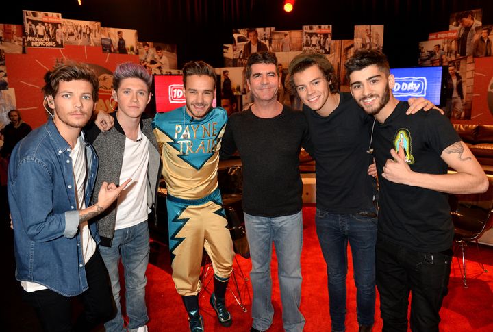 1D with Simon Cowell in 2013