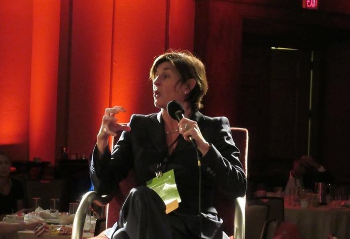 <em>Colliers International Executive Vice President Kitty Wallace, speaking at a Bisnow event</em>