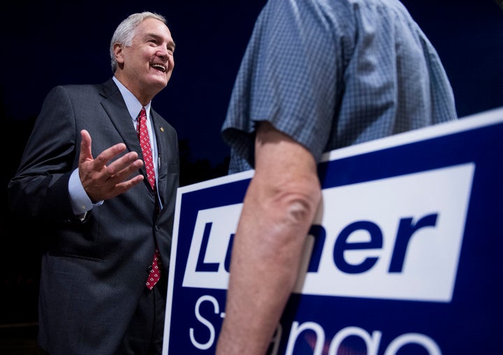 GOP candidate for U.S. Senate Sen. Luther Strange, R-Ala., speaks with a supporter after the U.S. Senate candidate forum