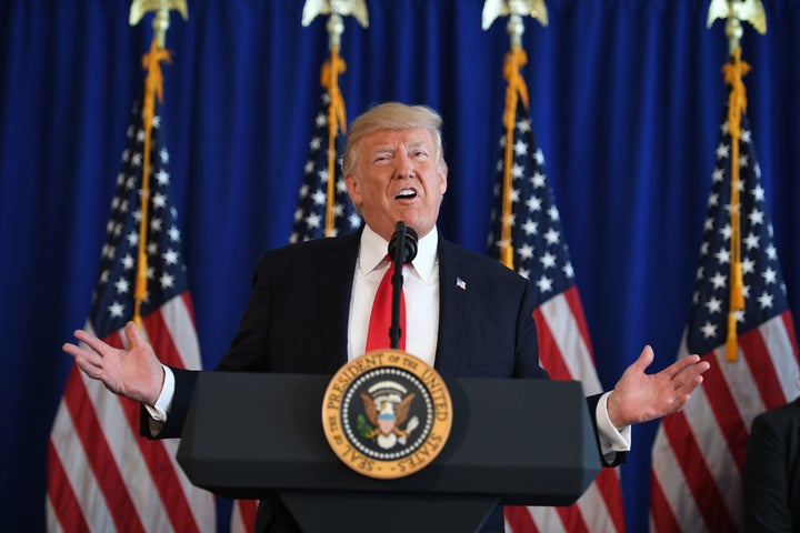 Trump speaks to the press about protests in Charlottesville at Trump National Golf Club in Bedminster, New Jersey, Aug. 12, 2017.