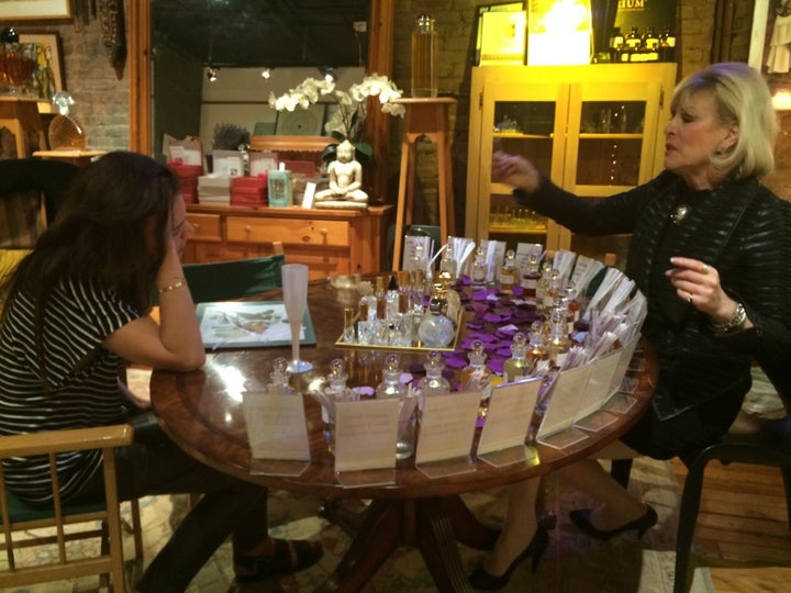 <p>Sue Phillips helps Katie Holmes find her signature scent. </p>