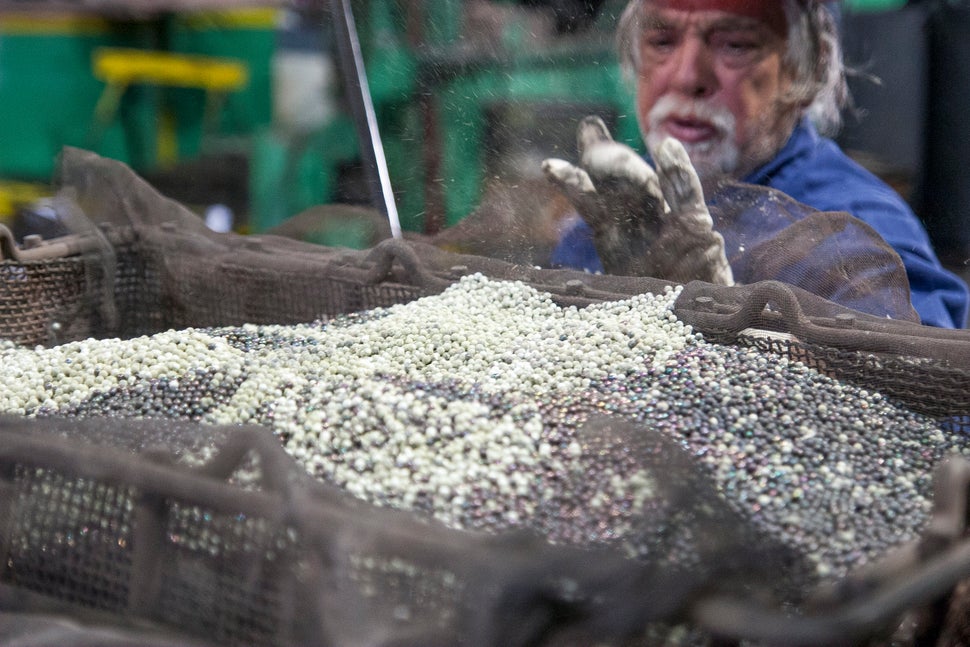 Qu's formerly high-powered magnets cool after demagnetizing in an industrial gas furnace.