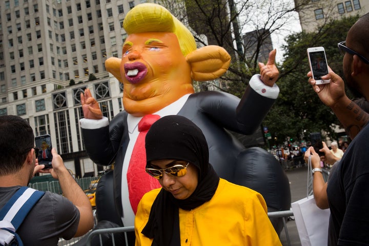 Trump the Rat makes its debut near Trump Tower in New York City. 