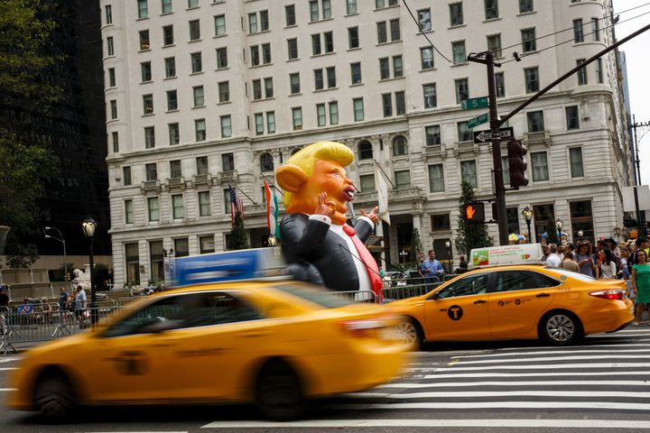 Trumpy the Rat stands at the corner of Fifth Avenue and 59th Street, a few blocks from Trump Tower. 
