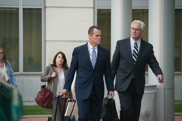 Taylor Swift's lawyer Doug Baldridge, centre, heads into court