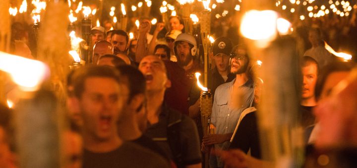 White supremacists march with Tiki torches through the University of Virginia campus in Charlottesville, Virginia.