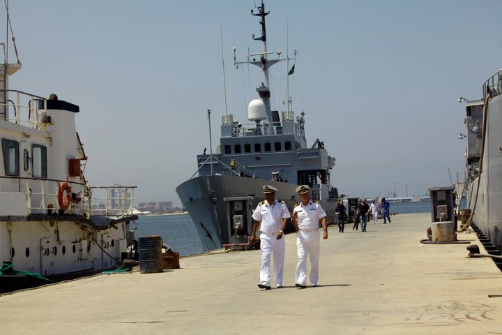 Navy troopers walk in front of Italian navy ship Tremiti in a dock in Tripoli, Libya August 10, 2017.