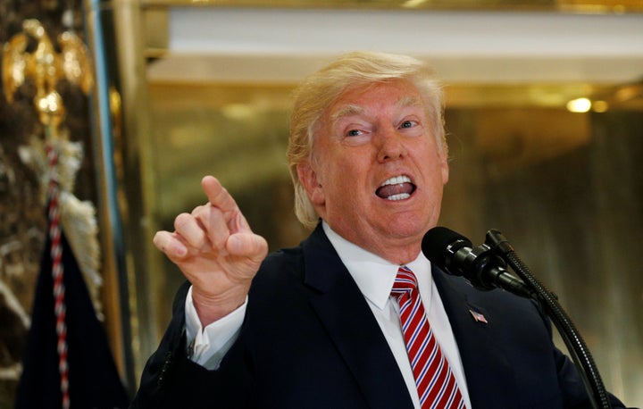 <strong>Donald Trump talks to reporters in the lobby of Trump Tower</strong>