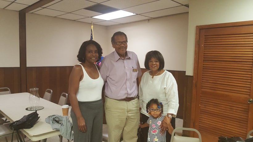 J.W. Cleary, head of the Paducah NAACP, poses with friends and family at the Eighth of August prayer breakfast.