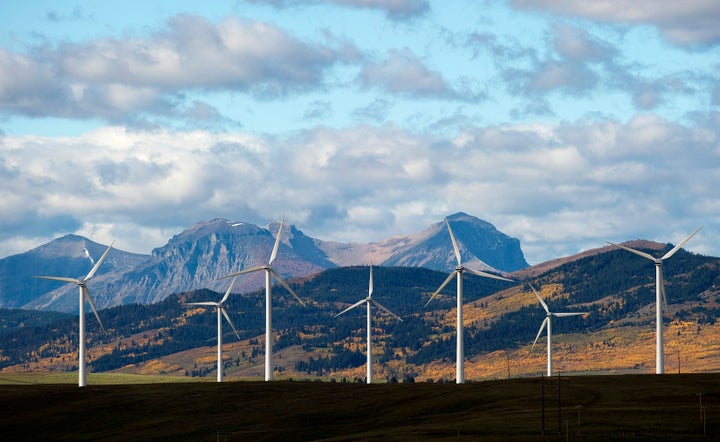 Windmills generate electricity in the foothills of the Rocky Mountains near the town of Pincher Creek, Alberta, Canada.