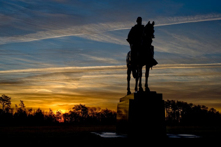 At sunrise the statue of Gen. Thomas J. "Stonewall" Jackson stands over Manassas National Battlefield Park in Virginia. Many cities are hoping to relocate Confederate monuments to parks that put the history of the Civil War into perspective.