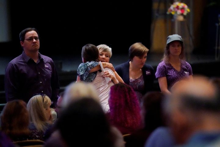 Mourners gather inside the Paramount Theater for a memorial service for Heather Heyer.