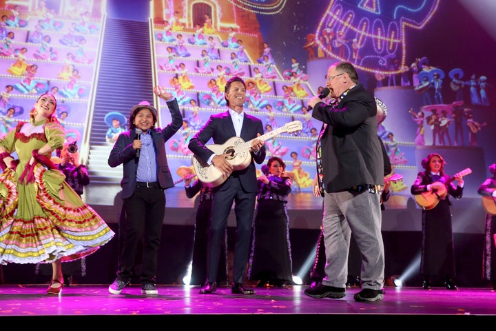 Part of the cast from "Coco" and Chief Creative Officer of Pixar and Walt Disney Animation Studios John Lasseter at Disn
