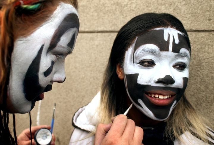 Two teenagers paint their faces before an Insane Clown Posse concert in Denver.