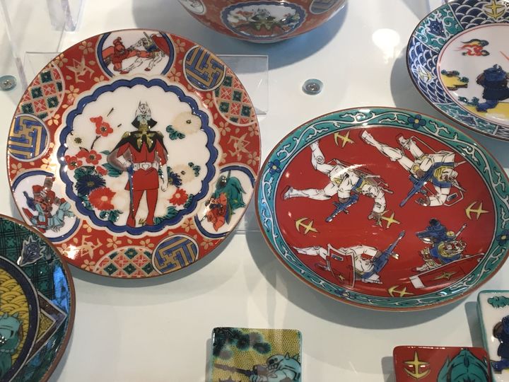 Gundam-themed ceramic ware in Japan’s traditional Imari style for sale at the Gundam Cafe. 