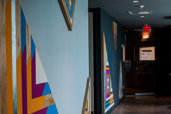 <p><strong>Scotty Wonders.</strong> Led by Scott Hendler, this custom furniture and space design company works with sustainable and holistic wood pieces. Having worked on known local spaces such as Zak the Baker and Paulie Gee's, Scott’s play on wood and color adorns one of our largest walls.</p>
