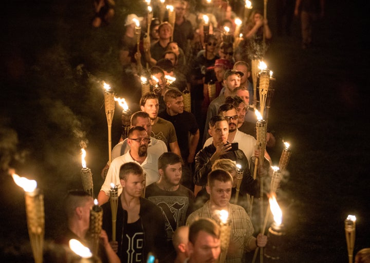 Chanting "White lives matter!," "You will not replace us!" and "Jews will not replace us!" several hundred white nationalists and white supremacists carrying torches marched in a parade through the University of Virginia campus.