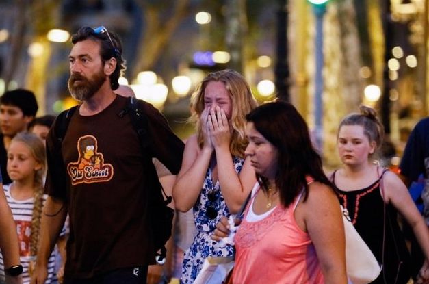Witnesses of the Barcelona terror attack at the scene of the incident 