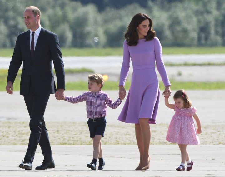 Prince William, Duke of Cambridge, the Duchess of Cambridge, Prince George and Princess Charlotte on the tarmac in Hamburg, Germany, on July 21.