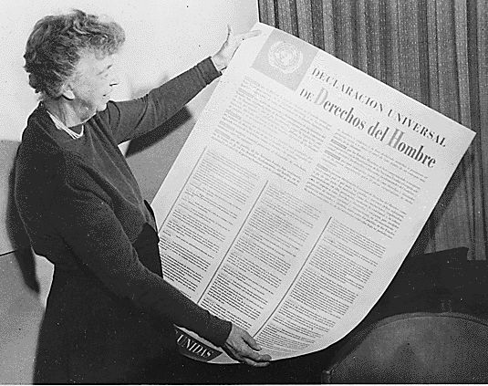 Eleanor Roosevelt with the Spanish version of the Universal Declaration of Human Rights (1948). 