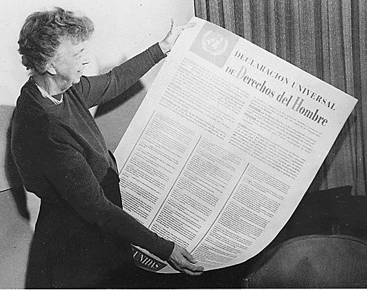 Eleanor Roosevelt with the Spanish version of the Universal Declaration of Human Rights (1948).