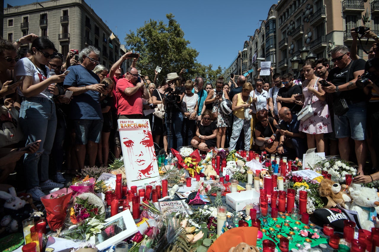 Tributes were laid at the exact spot the van came to a halt on Thursday evening