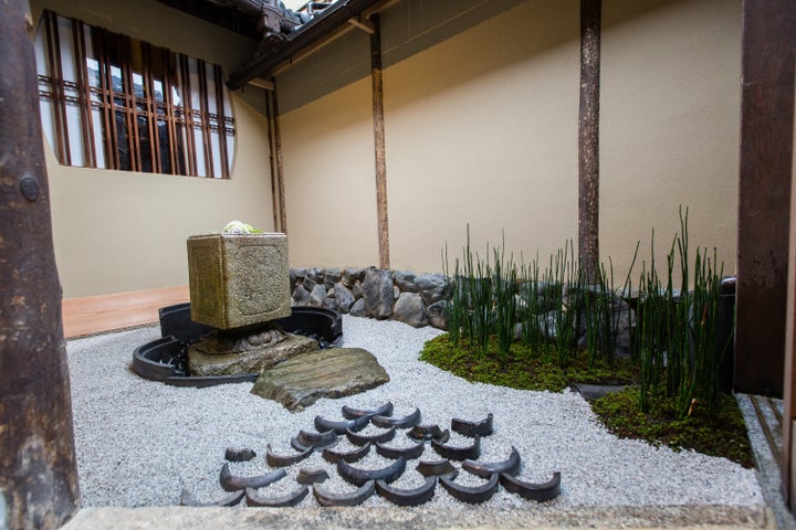 A view of one of the Japanese traditional gardens at Kyoto's traditional-style Starbucks branch.