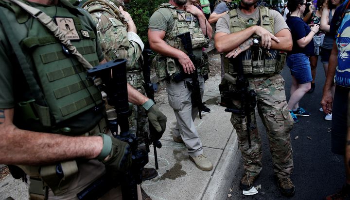 Members of a militia stand near a rally in Charlottesville, Virginia, U.S., August 12, 2017. 
