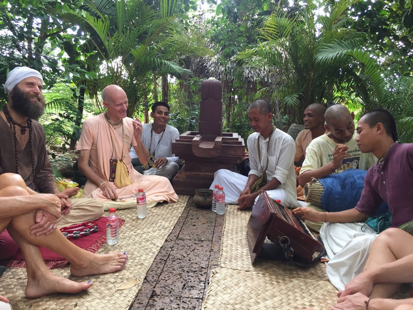 Blessing of the cow ceremony with local monks