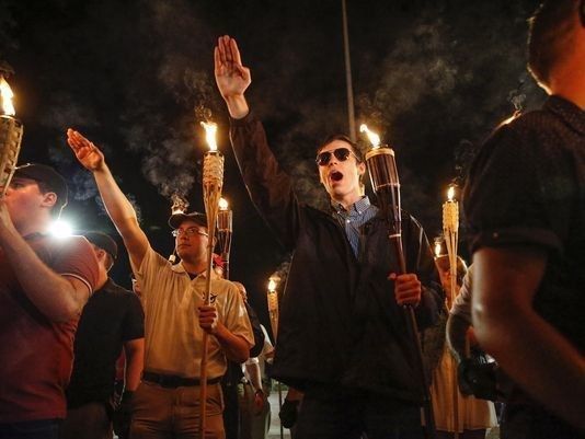 A haunting image from the Unite the Right Rally in Charlottesville, where they marched chanting slogans such as "Jews will not replace us", and "Blood and Soil" a Nazi refrain.