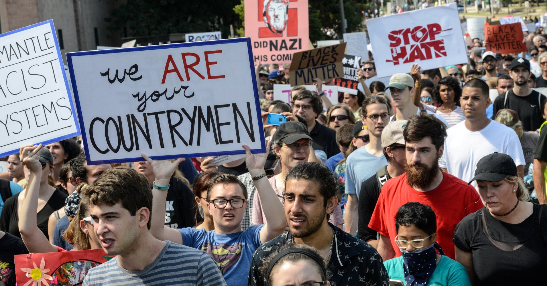 Woman Protects Trump Supporters From Crowd, Showing Us How To Combat Hate