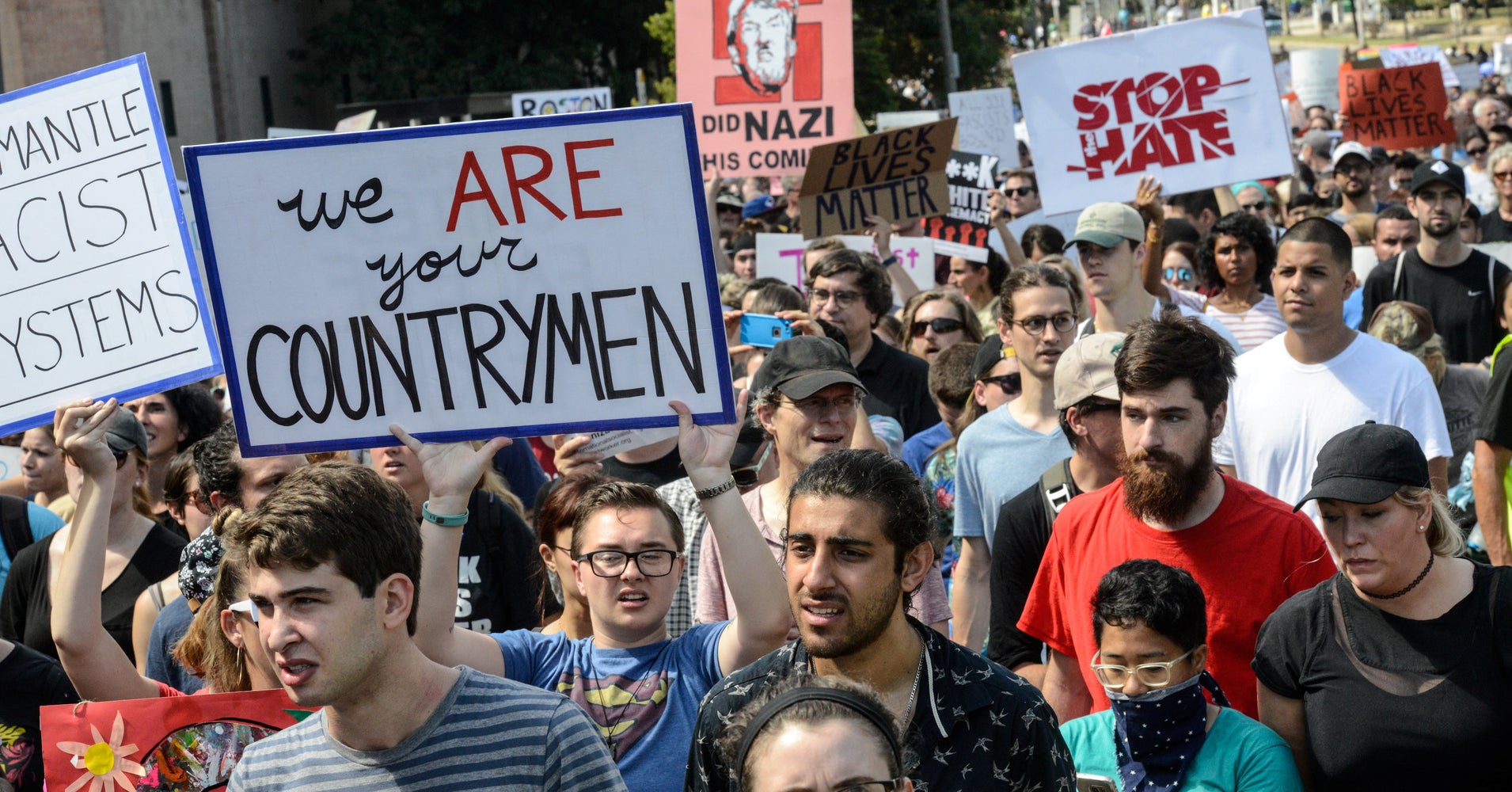 Woman Protects Trump Supporters From Crowd, Showing Us How To Combat 