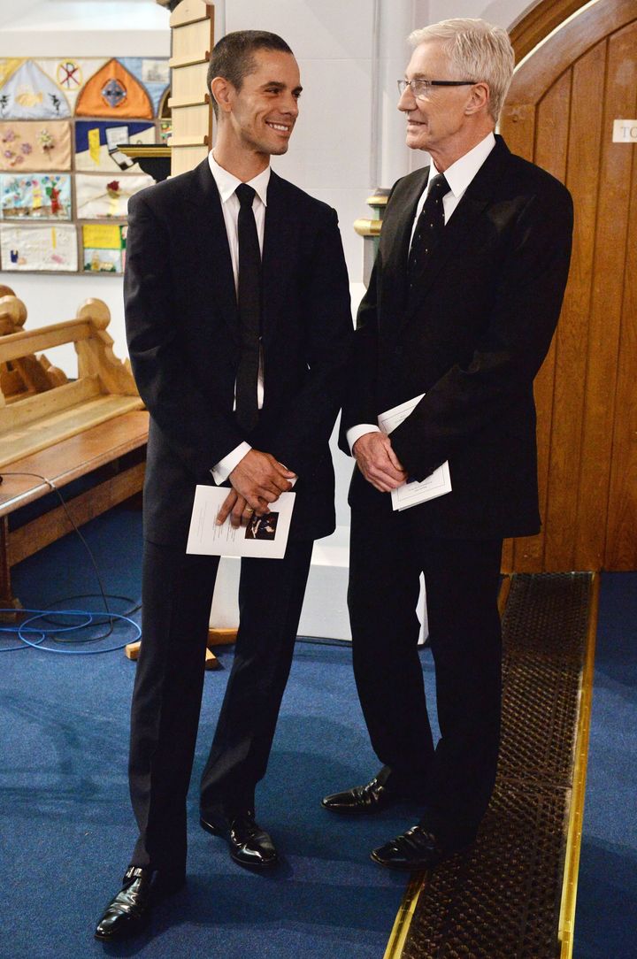 Paul O'Grady (right) with his new husband Andre Portasio
