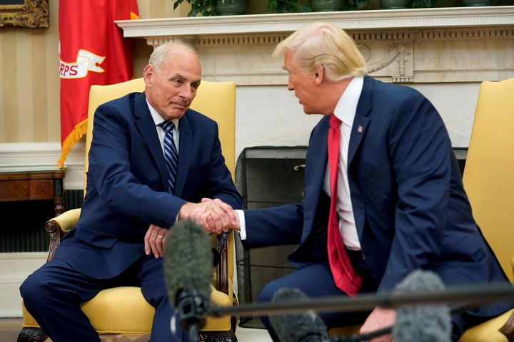 President Donald Trump shakes hands with John Kelly after he was sworn in as White House Chief of Staff in the Oval Office of the White House in Washington, U.S., July 31, 2017