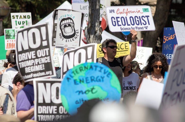 Marchers listen to speakers in Pershing Square during the March for Science in Los Angeles, California April 22, 2017.