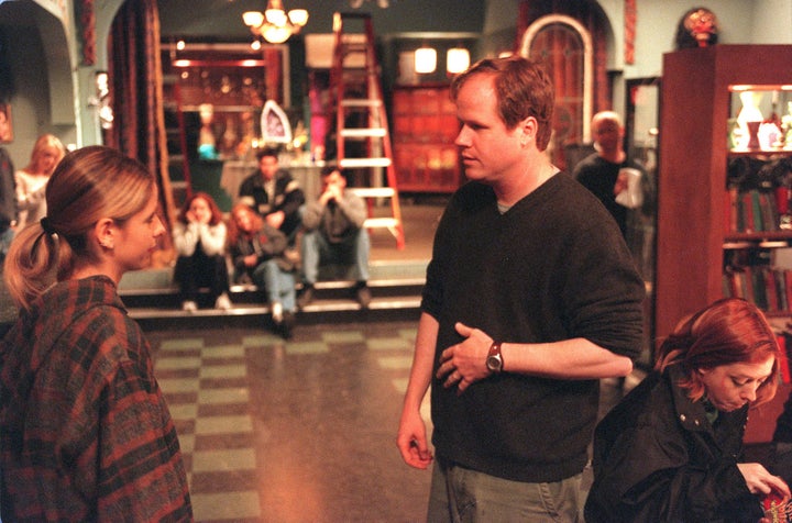 Whedon on the "Buffy The Vampire Slayer" set with actress Sarah Michelle Gellar in 2001. 