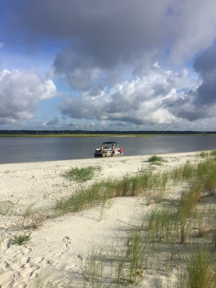 The boat and the other island in the background.