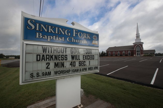Sinking Fork Baptist Church displays a message related to the upcoming solar eclipse to motorist who...