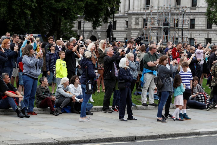 People use their phones to film Big Ben's final chimes