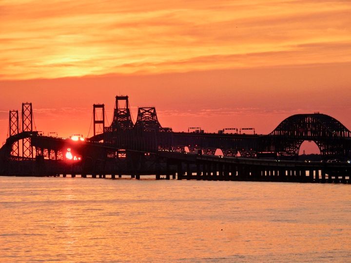 <p>Sunset through Chesapeake Bay Bridge from Hemmingway’s Restaurant, Kent Island MD</p>