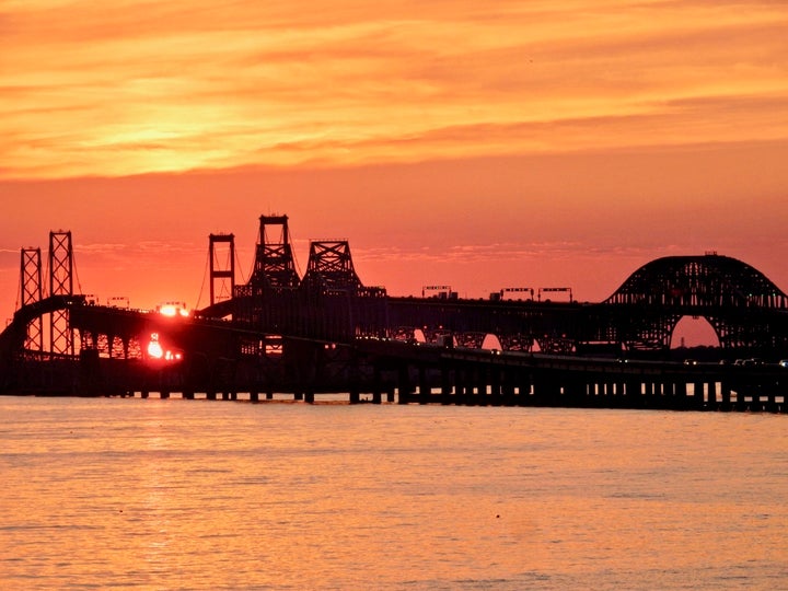 <p>Sunset through Chesapeake Bay Bridge from Hemmingway’s Restaurant, Kent Island MD</p>