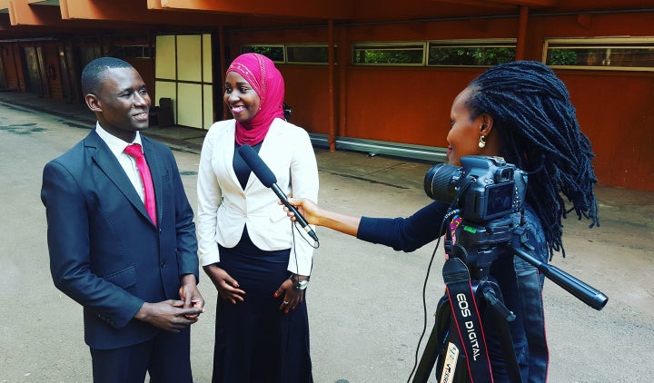 <p>Media Challenge Initiative trainee, Allen Mukiza, conducting an interview. </p>