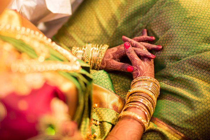 The ruling has been interpreted as a victory for women. Pictured are the mehndi hands of an Indian bride (file picture)
