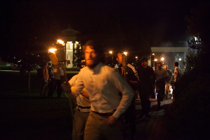 Button-front shirts and tiki torches were abound in Charlottesville on Aug. 11.