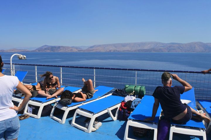 Backpackers camping out on the main deck of Cruise Europa