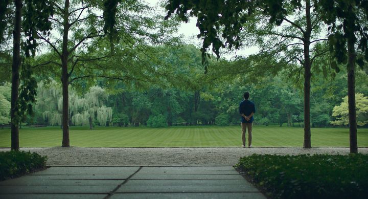 Publicity still for Columbus showing male lead John Cho in the Miller Garden.