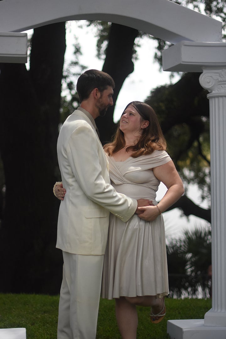 Julian Simmons and Melissa Tuttle said their I-dos in a gorgeous casual setting on the lawn of Kaminski house as the eclipse was about half-way in.